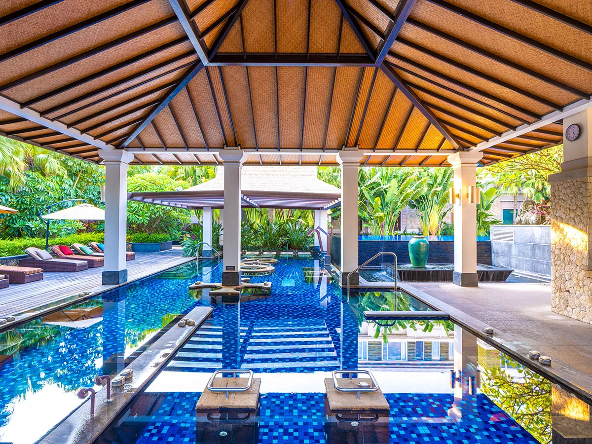 Sheltered water therapy pool reserved for guests staying at Riyuegu Hotsprings Hotel.